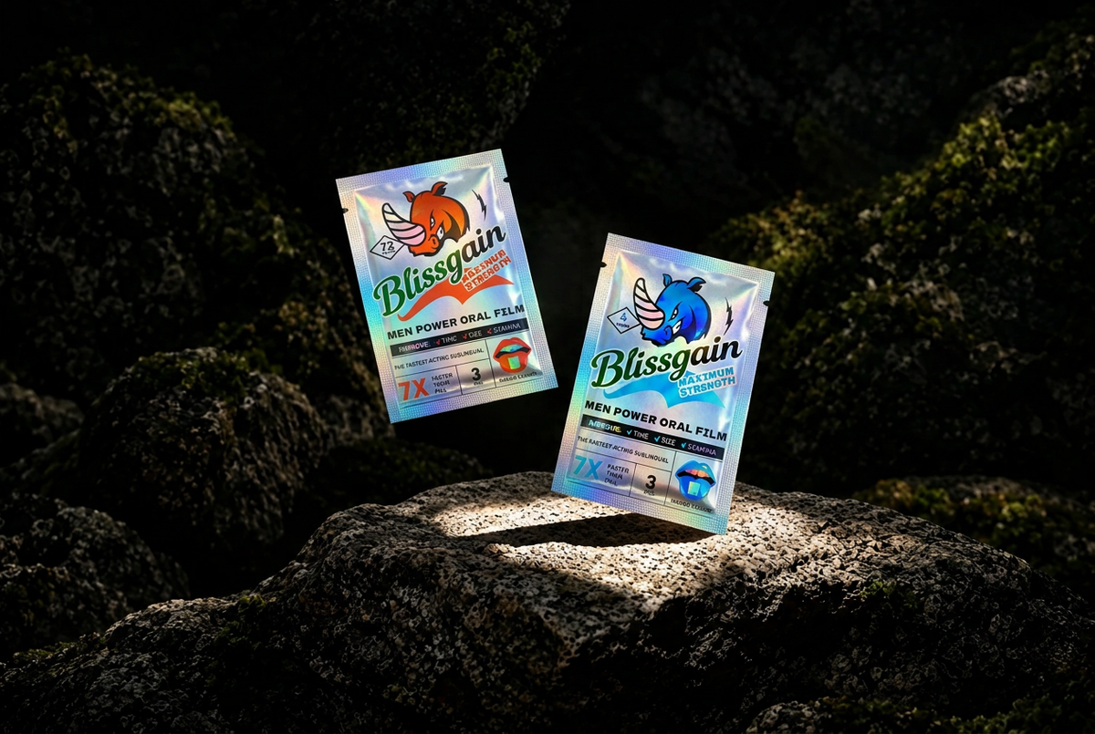 Blissgain PowerStrips in orange Mango and blue on a rock at dusk